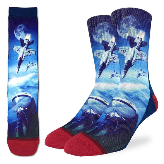 These fun socks feature three white and grey fighter jets high in the Earth’s atmosphere. At the bottom of the image is a close up of a pilot with a high altitude helmet on. Two more jets fly on a background of the Earth and the Moon in the distance. The sole and back of the sock is a dark blue, while the toe and heel is red. The active fit socks sport elastic arch bands to contour to your feet and provide support.