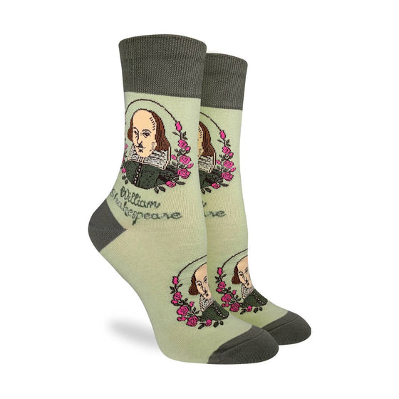 These fun socks feature an image of William Shakespeare with roses to the left and right of him and his name underneath. This image is on a background of a light green with a darker green toe, heel, and rim. Spandex added to the 85% cotton blend gives the socks the perfect amount of stretch to hug your feet.