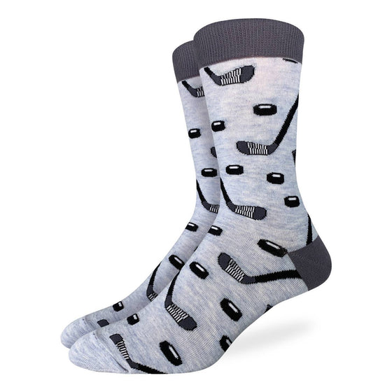 These fun socks feature black and white hockey sticks and pucks on a light grey background with a darker grey heel and rim. Spandex added to the 85% cotton blend gives the socks the perfect amount of stretch to hug your feet.