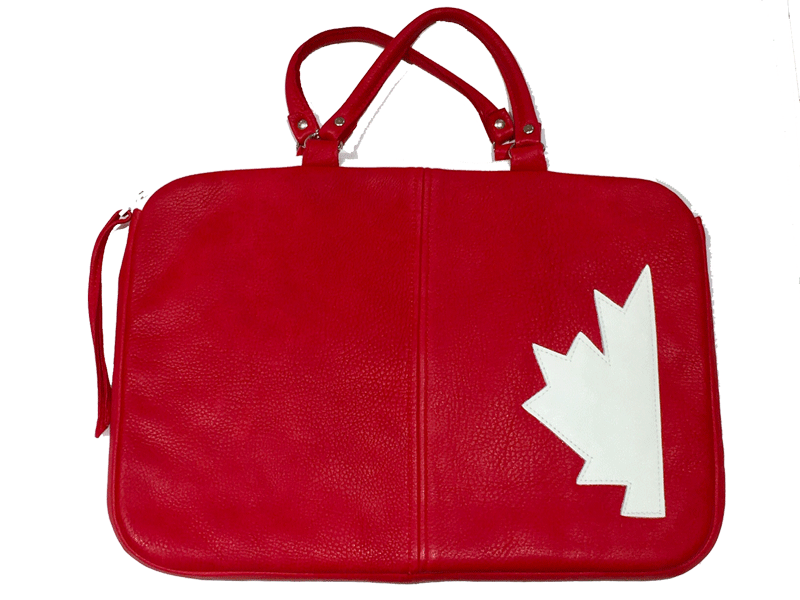 A red leather laptop bag with half a white maple leaf stitched on the right side. The bag has two top handles and a zipper closure with a long red tassel. The leather looks soft but sturdy. 
