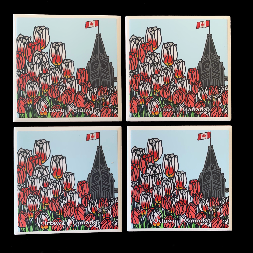 This set of four ceramic coasters features an art print of the peace tower and a field of tulips. The tower is to the right of the picture and is flying the Canadian flag. Across the left and bottom are red tulips and Canada 150 tulips, which are white with fiery streaks of red .At the bottom of the coaster the words “Ottawa Canada” are written in white text. At the bottom right is the artist’s mark—a small picture of a bee.