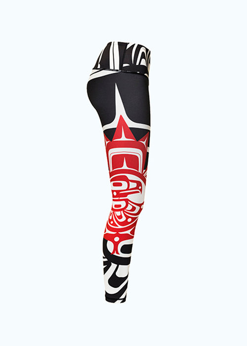 The eagle maple leaf leggings viewed from the right. This angle provides a clear view of the small red and white eagle maple leaf motif.