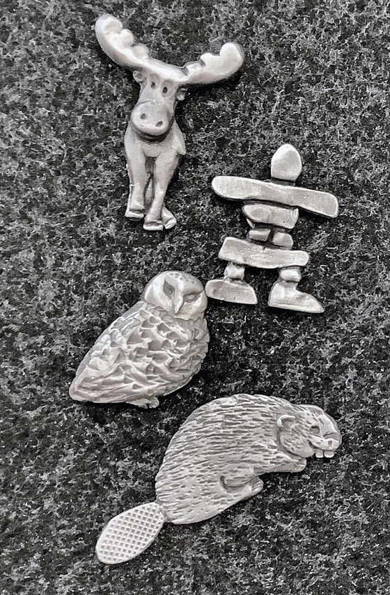 This set of four magnets includes a moose, beaver, owl, and an inukshuk. 