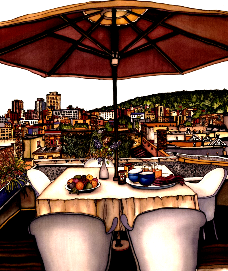 This print shows a rooftop table overlooking Montreal. A bowl of fruit and a tray with four bowls and glasses sit on the table. The table is shaded by a large sun umbrella. The view of the city shows a mix of old architecture and modern skyscrapers. This print recreates the rich watercolours of the original painting.