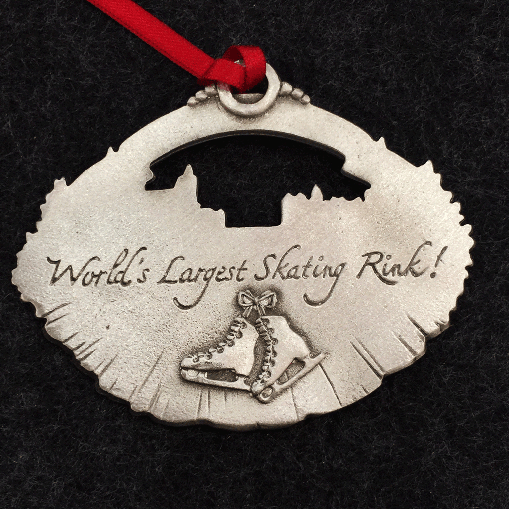 Reverse side of the first image, the words  World's Largest Skating Rink! written in with a pair of figure skates hanging below them. 
