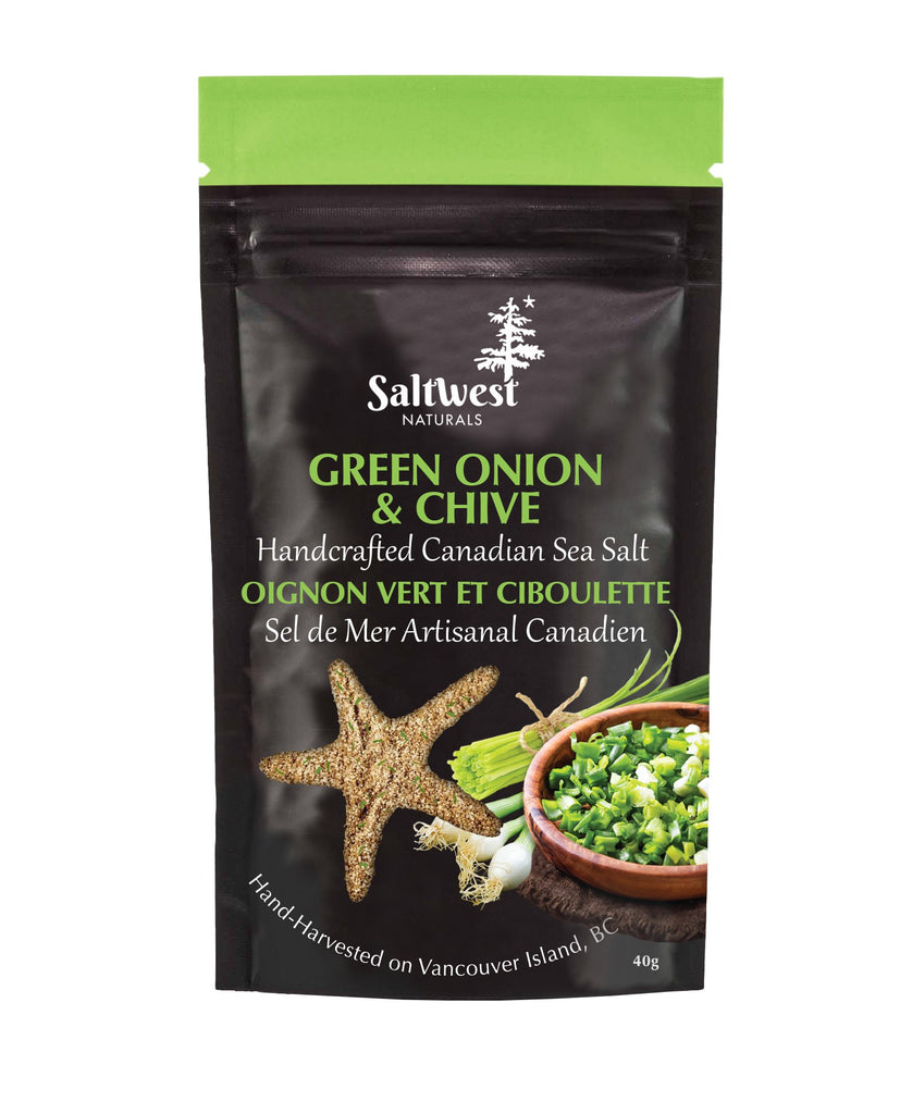 45g of Green Onion & Chive Sea Salt. Salt is in a black standing bag, with a picture of a bowl of cut up gree onion and chives, along with full green onions and chives behind the bowl.There is also a transparent cutout of a starfish.