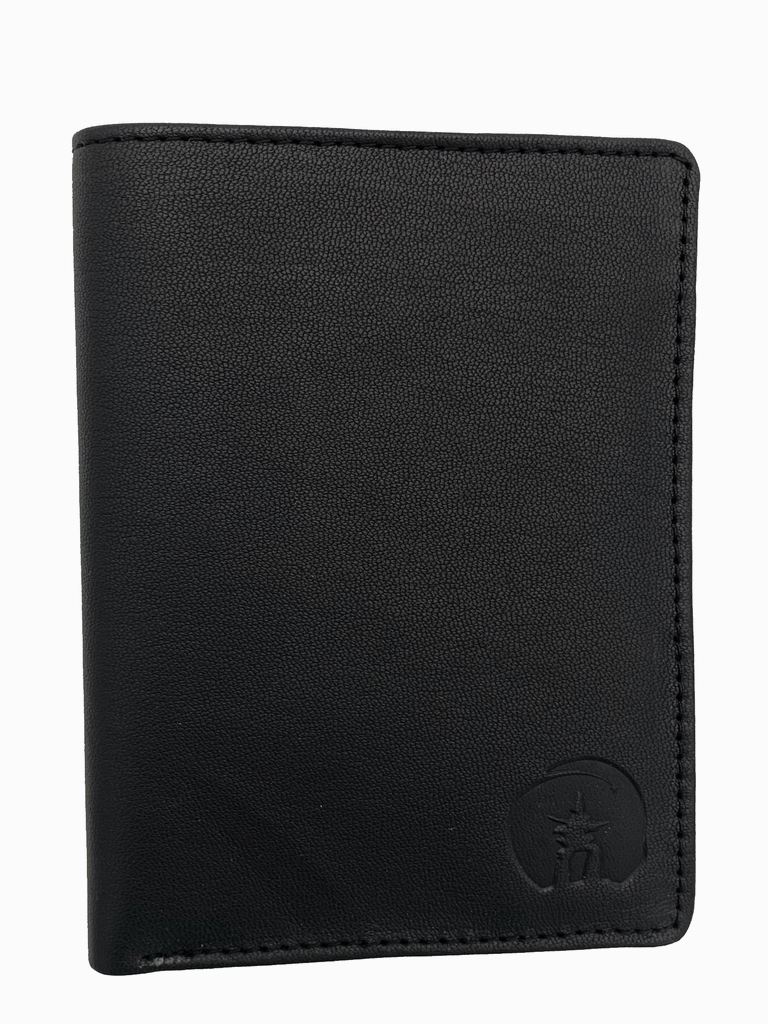 Rectangular black wallet formed using sealskin, and has an inukshuk emblem in the bottom right corner of the wallet.