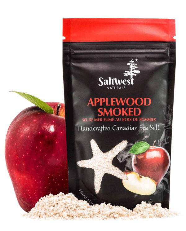 45g of Applewood Smoked Canadian Sea Salt. Salt is in a black standing bag, with a picture of an apple with smoke coming out of it. There is also a transparent cutout of a starfish.