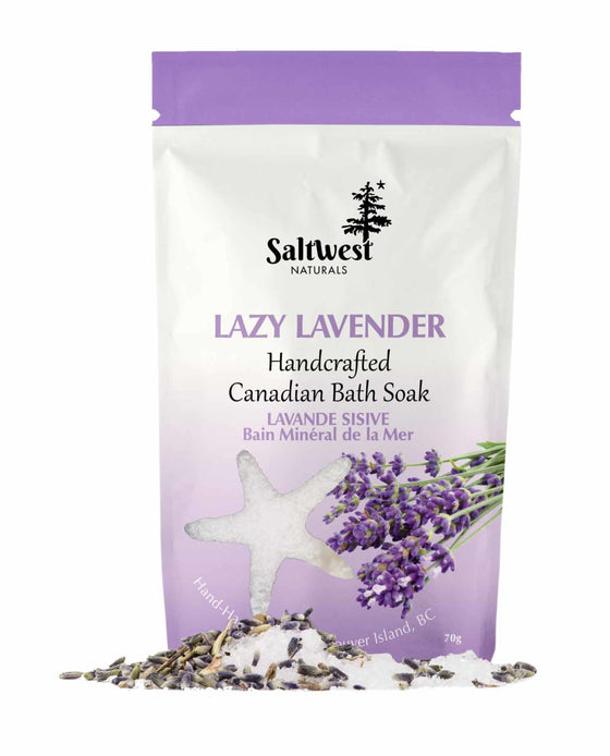70 grams of Lavender bath soak in a white and purple standing bag. 
