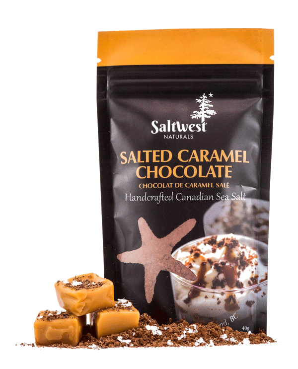 45g of Salted Caramel Chocolate Sea Salt. Salt is in a black standing bag, with a picture of a cup of dessert, with caramel syrup and chocolate crumbs on top of it. There is also a transparent cutout of a starfish.