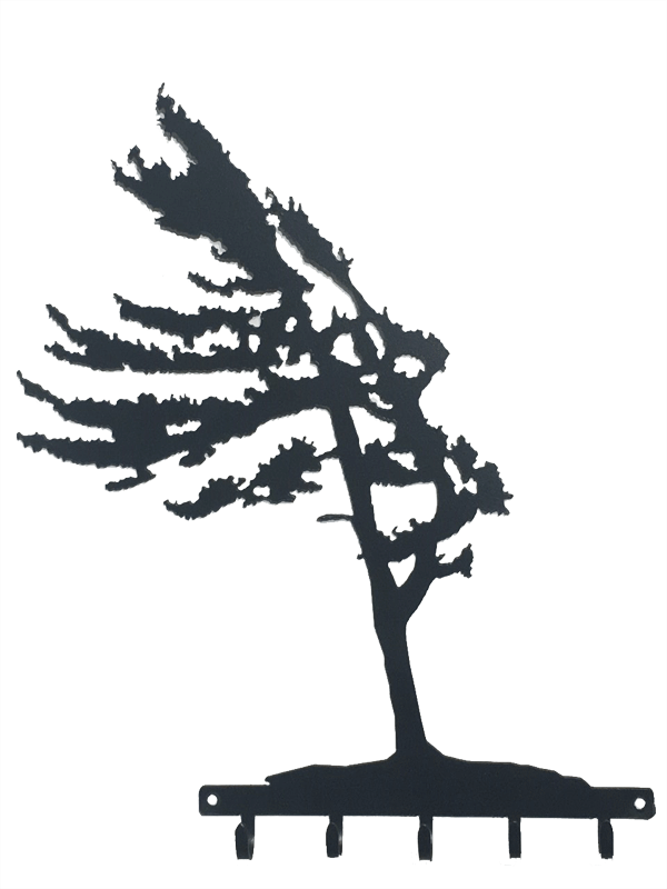 This metal sculpture shows the matte black silhouette of a pine tree being blown in the wind. It leans slightly to the left, branches flowing elegantly. Its straight trunk and fully foliage give an impression of hardiness and strength despite the strong wind. At the base of the tree is a metal strip from which five hooks emerge. The metal strip has two holes punched through it, allowing the piece to be nailed or screwed into a wall.